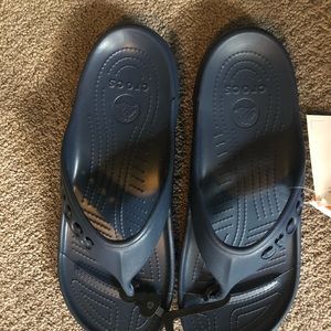 Women’s size 12 navy blue baya flip crocs.